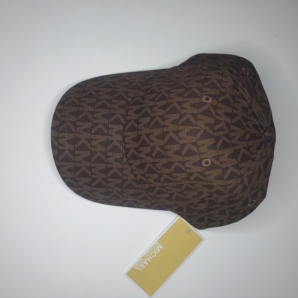 adjustable cap with magic closure.  one size, brown MK. Unisex